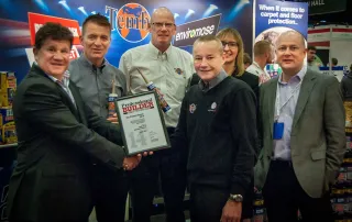 Team members from Tembe being presented a professional builder awards for Hippo PRO3